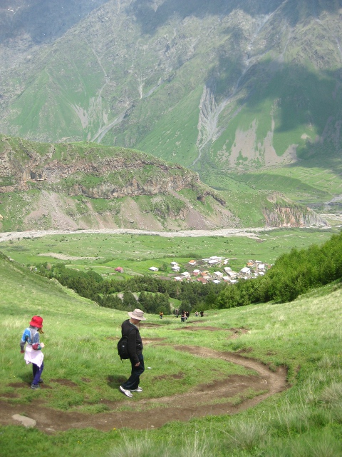 Vernon and Cielo walking down the mountain