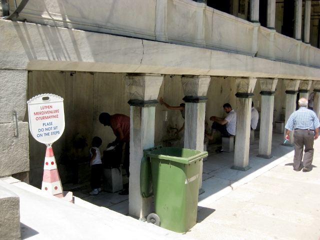 washing feet outside the Blue Mosque