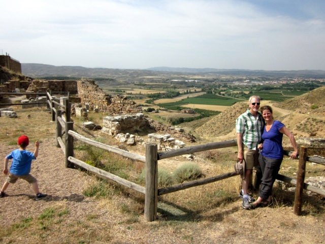 Eero throws while Vernon and Alison smile for camera