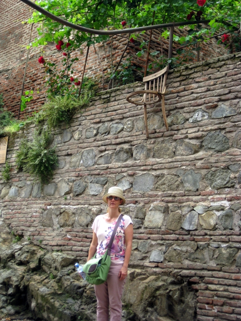 chairs hanging from a wall