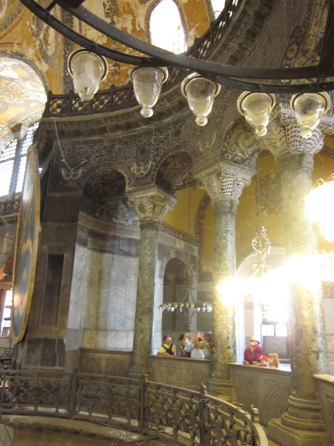 Alison, Cielo and Eero on balcony