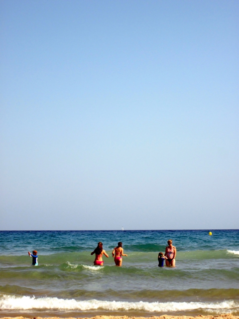 alison and the kids in the water