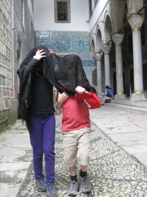 Eero and Cielo with heads covered